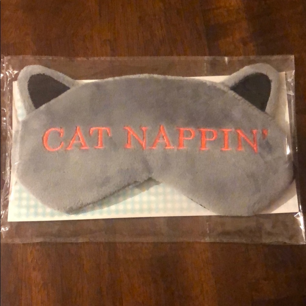 Cat napping sleeping mask.